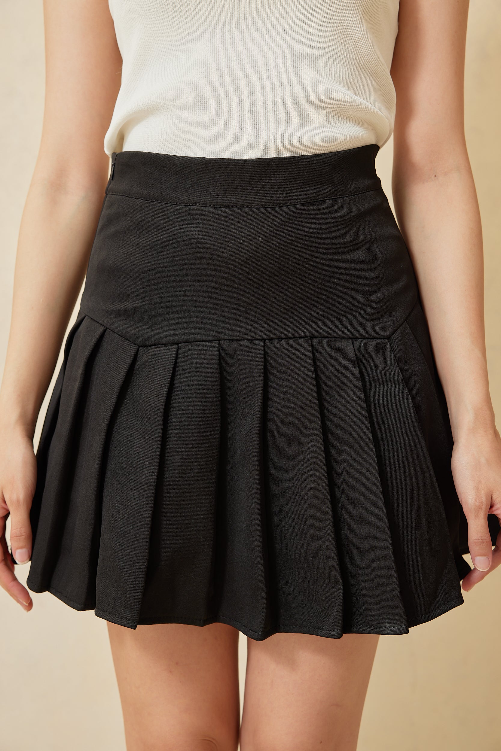 Bevelia Pleated Mini Skirt