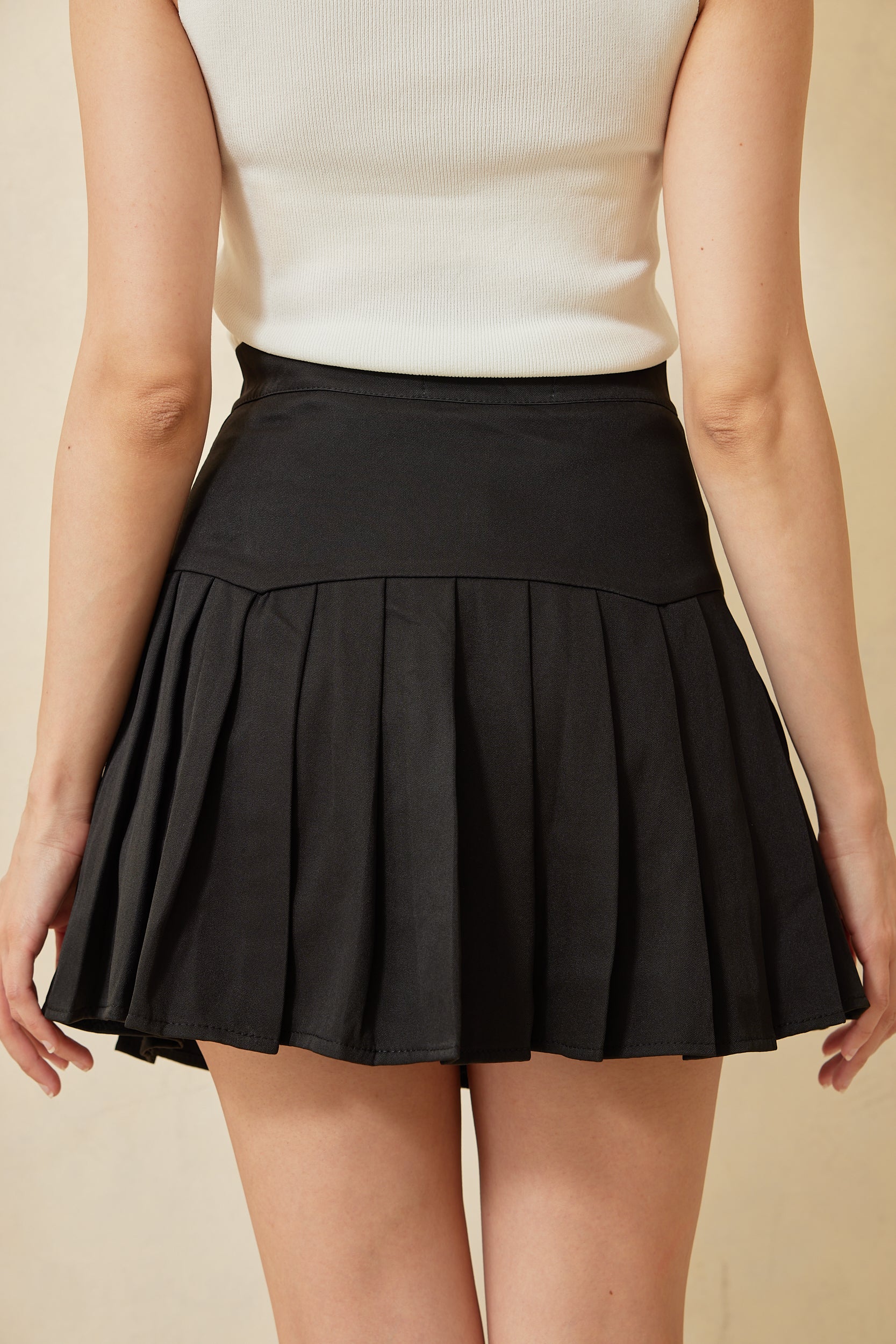 Bevelia Pleated Mini Skirt