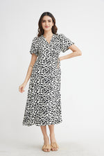 Load image into Gallery viewer, Jacylie Midi Wrap Dress in Black

